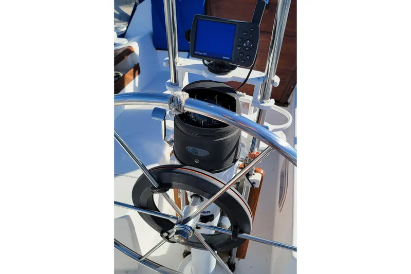 Slide: The Image of Steering wheel and navigation equipment on a 1993 Catalina 28 sailboat. - 5