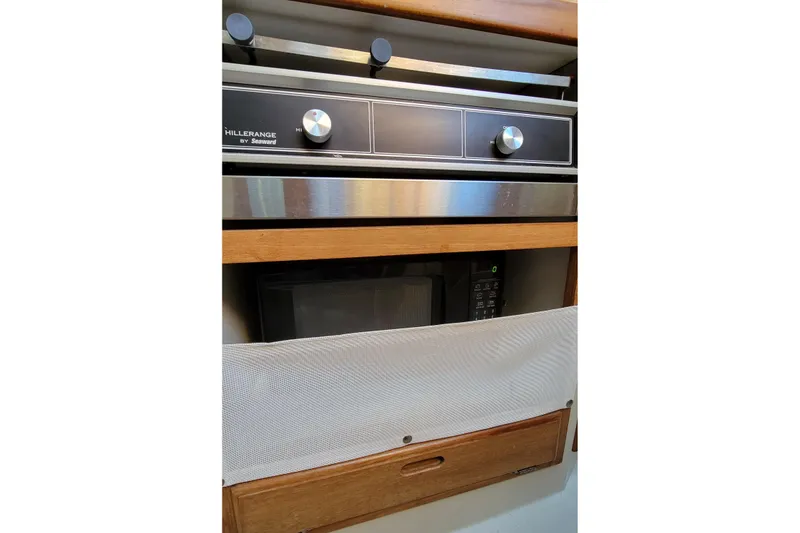 Slide: The Image of Interior of 1993 Catalina 28 with Hillerange stove and microwave. - 20