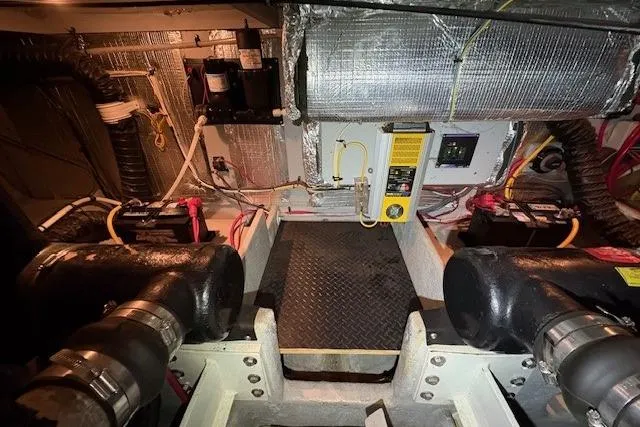 Slide: The Image of 2003 Silverton 39 Motor Yacht on stands in storage facility. - 22