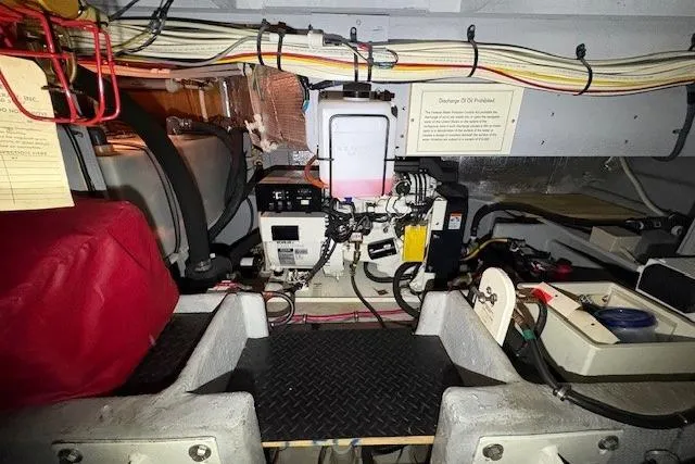 Slide: The Image of 2003 Silverton 39 Motor Yacht in storage, showcasing sleek design and sturdy construction. - 23