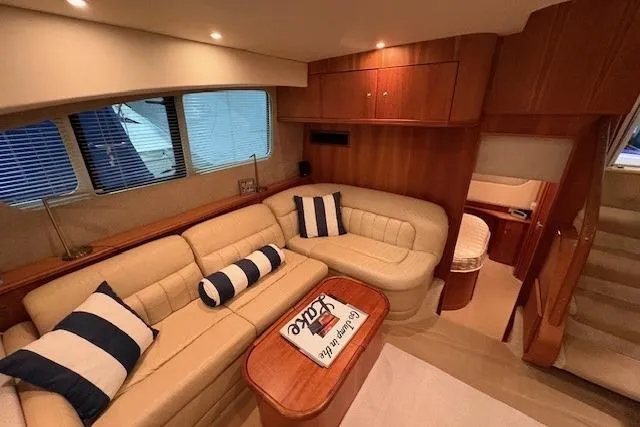 Slide: The Image of Engine room of 2003 Silverton 39 Motor Yacht with visible machinery and wiring. - 27