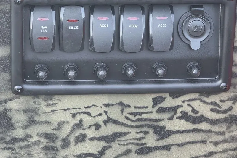 Slide: The Image of Control panel of 2026 Tracker Grizzly 1650 T Prairie Wings Edition boat. - 12