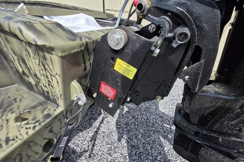 Slide: The Image of 2026 Tracker Grizzly 1650 T Prairie Wings Edition boat motor mount detail. - 16