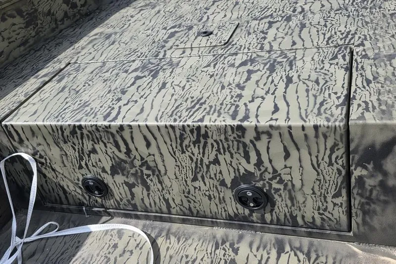 Slide: The Image of 2026 Tracker Grizzly 1650 T Prairie Wings Edition with camouflage pattern detail. - 20