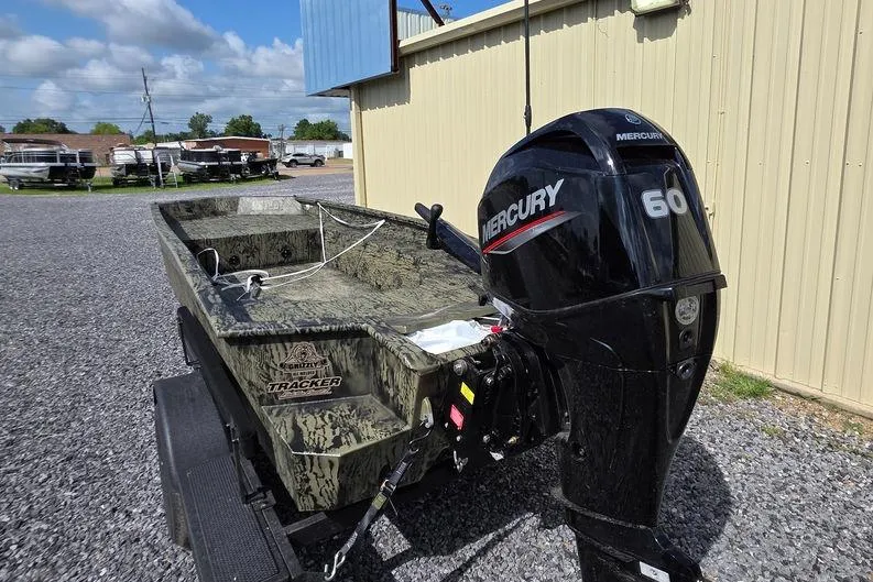 Slide: The Image of 2026 Tracker Grizzly 1650 T Prairie Wings Edition boat with Mercury 60 outboard motor. - 5
