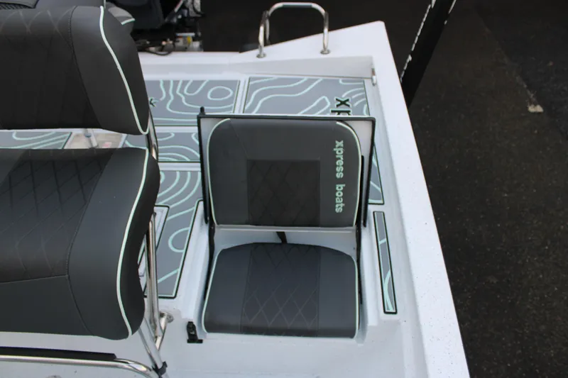 Slide: The Image of 2026 Xpress H22B Bay boat seat with stylish design and branding. - 3