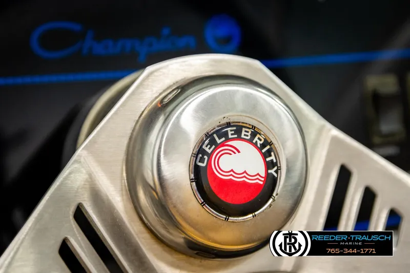 Slide: The Image of Close-up of 1988 Celebrity 180 V boat steering wheel with logo and branding. - 26