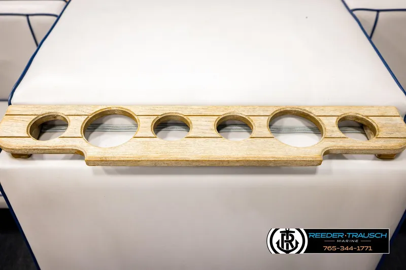 Slide: The Image of Wooden cup holder for 1988 Celebrity 180 V boat, displayed on white surface. - 34