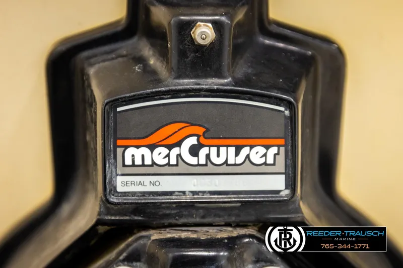 Slide: The Image of MerCruiser engine label on 1988 Celebrity 180 V boat, featuring Reeder-Trausch Marine contact. - 36