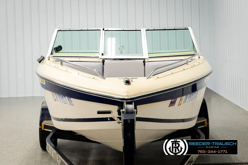 Slide: The Image of 1988 Celebrity 180 V boat on trailer in indoor storage facility. - 6