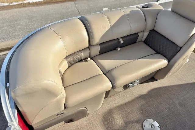 Slide: The Image of 2023 Sun Tracker Party Barge 22 DLX, beige seating, luxurious pontoon boat interior. - 19