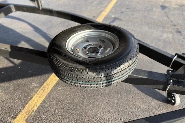 Slide: The Image of Spare tire on a 2023 Sun Tracker Party Barge 22 DLX trailer. - 33