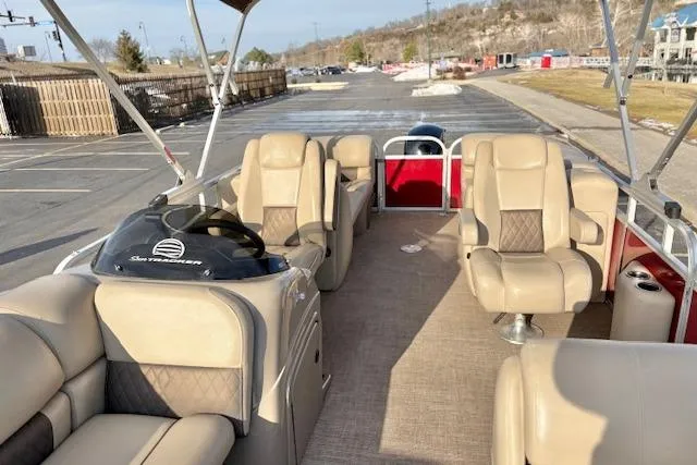 Slide: The Image of 2023 Sun Tracker Party Barge 22 DLX with beige seating and spacious deck layout. - 47