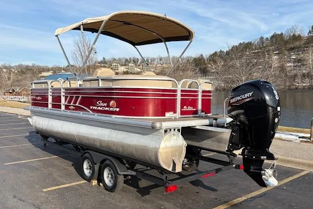 Slide: The Image of 2023 Sun Tracker Party Barge 22 DLX pontoon boat with Mercury engine on trailer. - 5