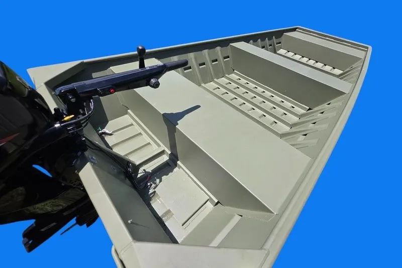 Slide: The Image of 2025 Weldcraft 1652-RL boat interior with motor, set against a blue background. - 7