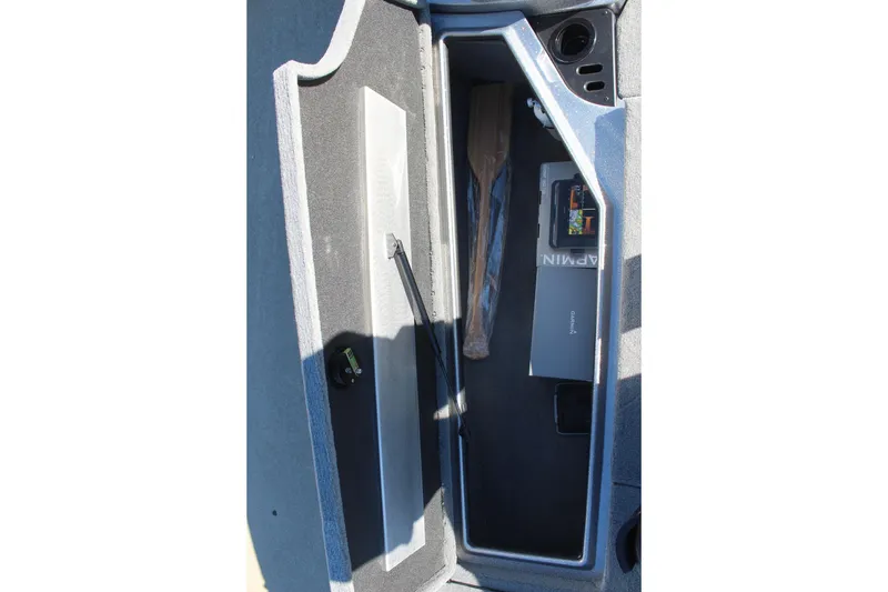 Slide: The Image of Storage compartment of 2026 Nitro Z18 Pro boat with accessories and equipment. - 13