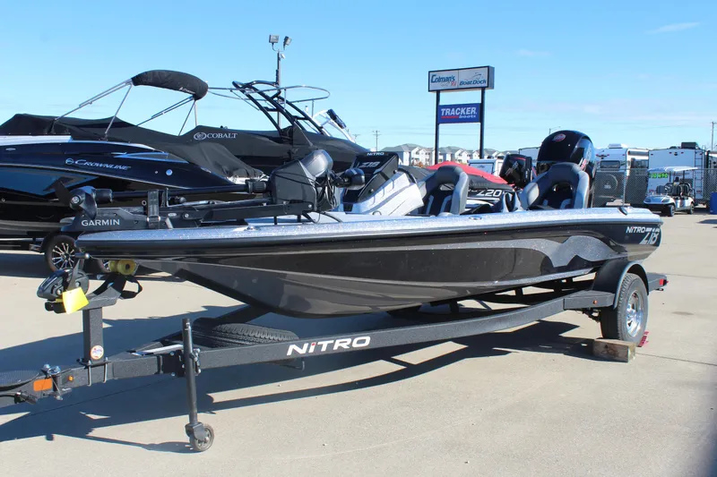 Slide: The Image of 2026 Nitro Z18 Pro fishing boat on trailer, parked at dealership. - 3