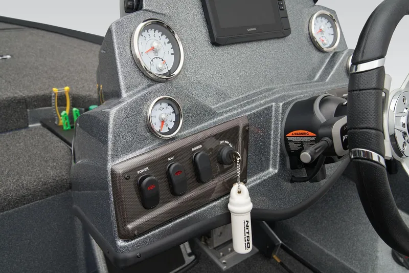 Slide: The Image of Manufacturer Provided Image: Control panel of a 2026 Nitro Z18 Pro boat with gauges and switches. - 47