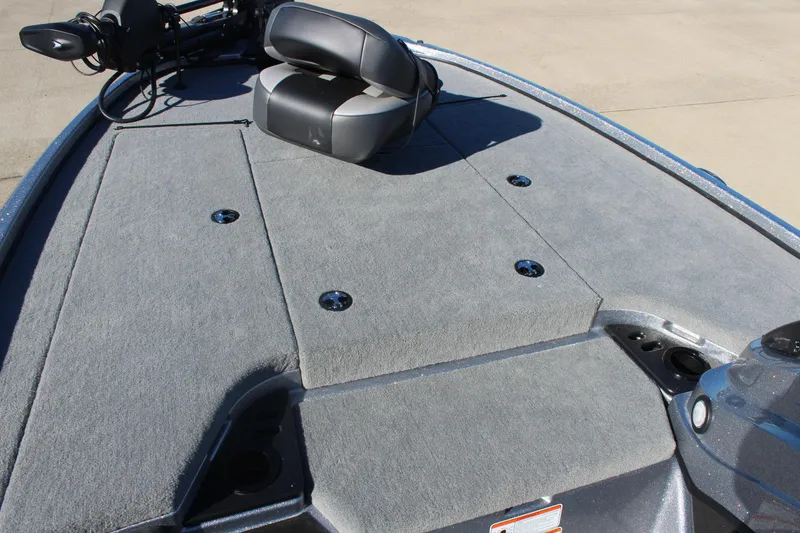 Slide: The Image of 2026 Nitro Z18 Pro boat deck with seating and carpeted surface. - 7