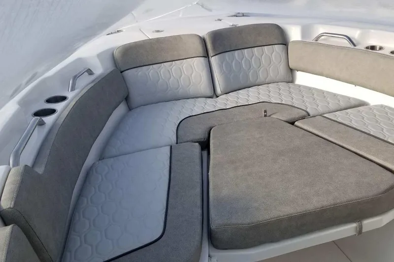 Slide: The Image of Luxurious seating area on 2022 Sea Fox 248 Commander boat, featuring comfortable cushions. - 11