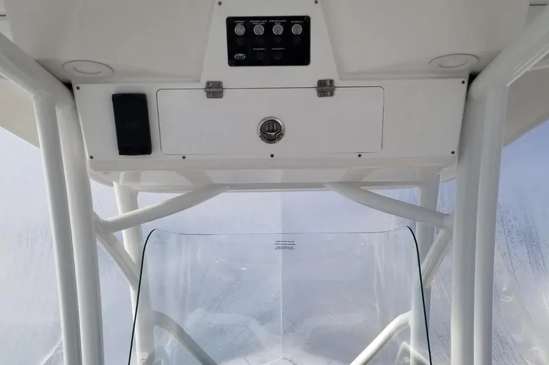 Slide: The Image of 2022 Sea Fox 248 Commander boat console with control panel and windshield. - 13