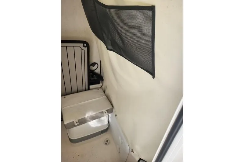 Slide: The Image of Interior of 2022 Sea Fox 248 Commander boat, featuring storage and seating area. - 8