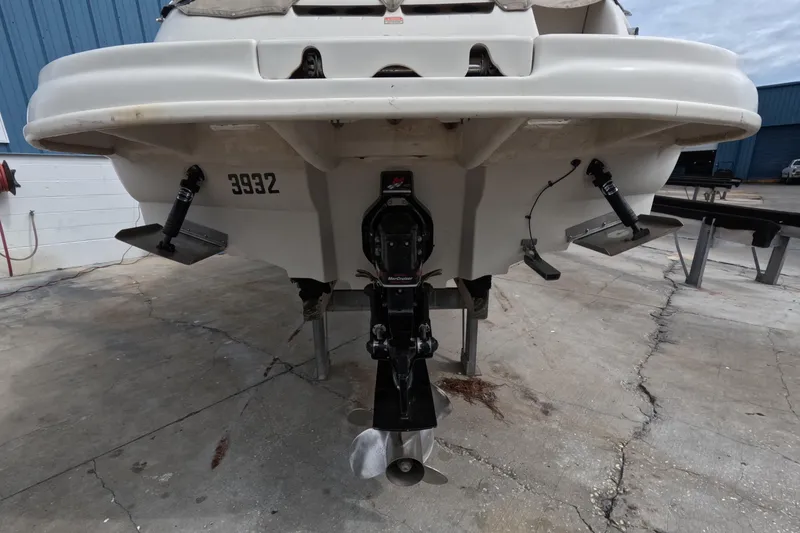 Slide: The Image of Rear view of 2001 Sea Ray 240 Sundeck boat on dry dock. - 18