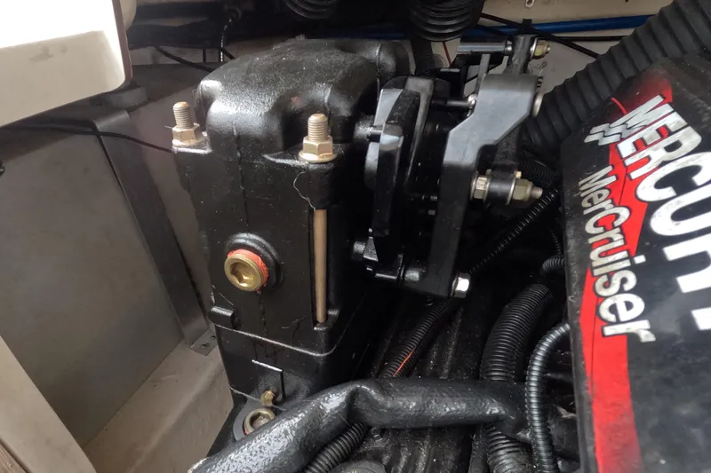 Slide: The Image of Engine compartment of a 2001 Sea Ray 240 Sundeck with MerCruiser components. - 70