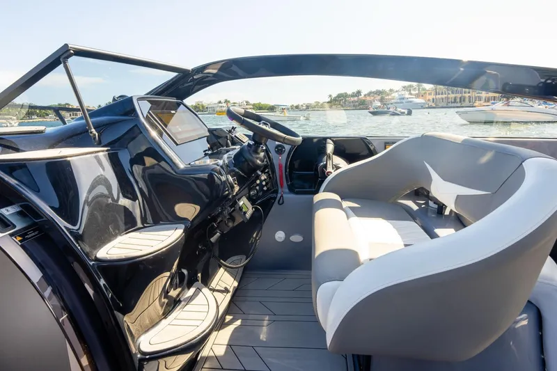 Slide: The Image of Luxurious 2026 Hanover 305 boat interior with sleek design and waterfront view. - 22