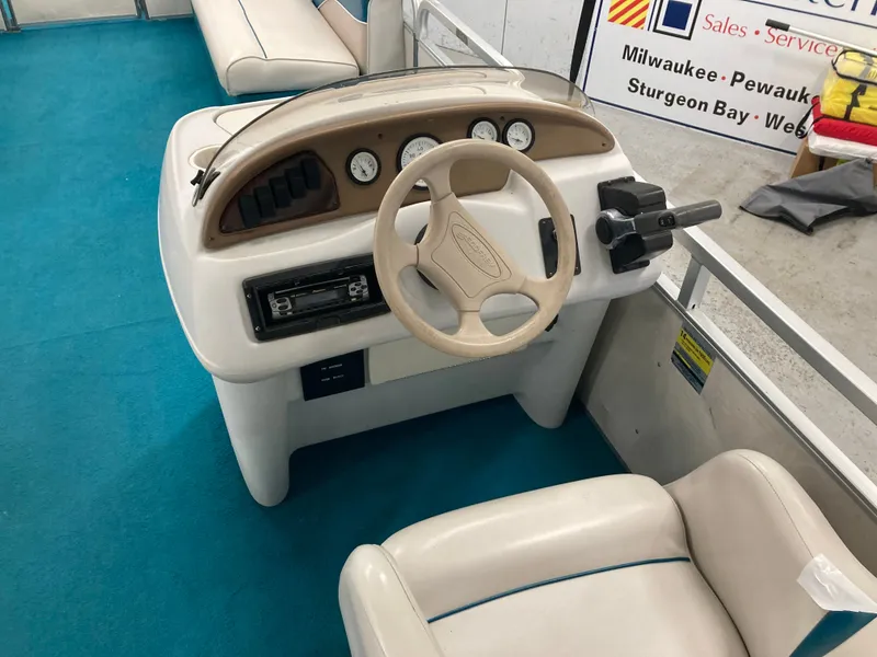 Slide: The Image of Control console of a 2000 Godfrey Sweetwater 24ELITE pontoon boat. - 28