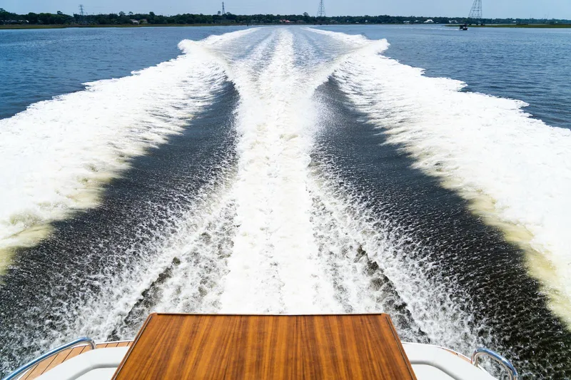 Slide: The Image of Wake trail behind Bavaria SR41 yacht, 2022 model, on open water. - 18