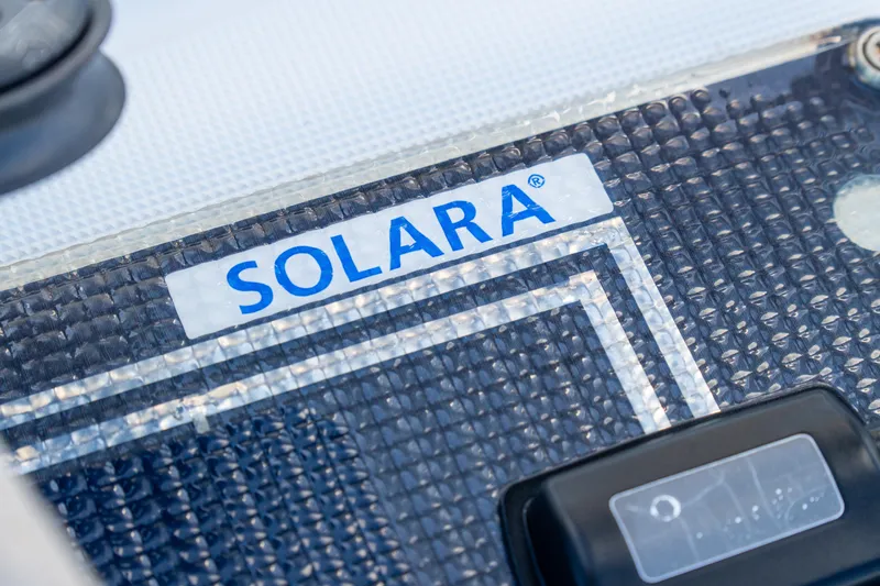 Slide: The Image of Close-up of Solara label on 2023 Lagoon 46 yacht surface. - 103