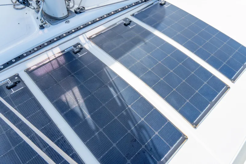 Slide: The Image of Solar panels on 2023 Lagoon 46 catamaran deck, harnessing renewable energy. - 104