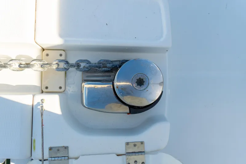 Slide: The Image of 2023 Lagoon 46 yacht anchor windlass with chain on deck. - 107