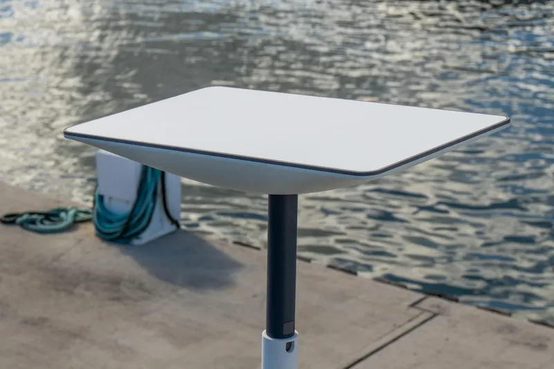 Slide: The Image of Modern table on a dock beside water, Lagoon 46, 2023 model. - 110