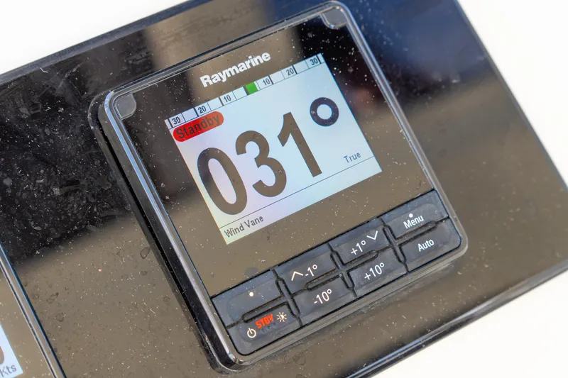 Slide: The Image of Raymarine display on 2023 Lagoon 46 yacht showing 031 degrees in standby mode. - 20