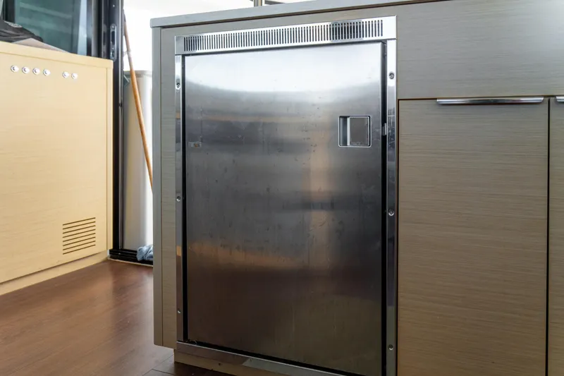 Slide: The Image of Stainless steel refrigerator in 2023 Lagoon 46 yacht interior. - 40