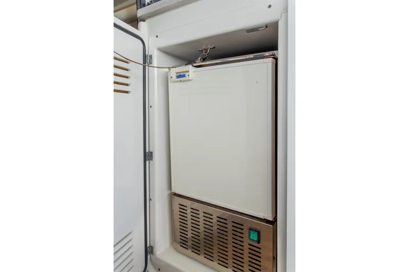Slide: The Image of Built-in refrigerator on 2023 Lagoon 46 yacht, featuring a compact design. - 42