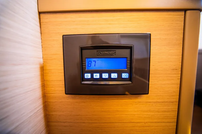 Slide: The Image of Digital control panel on 2023 Lagoon 46 yacht, displaying temperature settings. - 46
