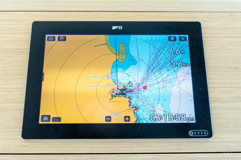Slide: The Image of Navigation display on 2023 Lagoon 46 yacht, showing nautical chart and data. - 54