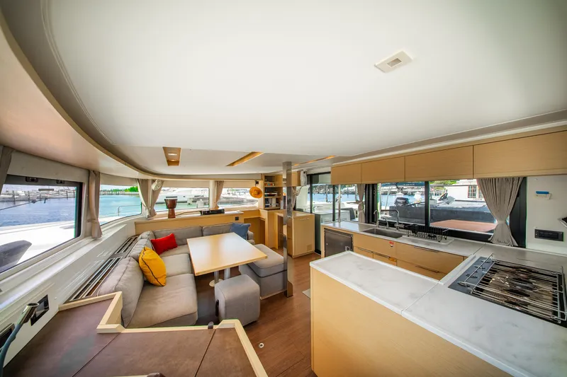 Slide: The Image of Luxurious interior of 2023 Lagoon 46 yacht with modern kitchen and seating area. - 56