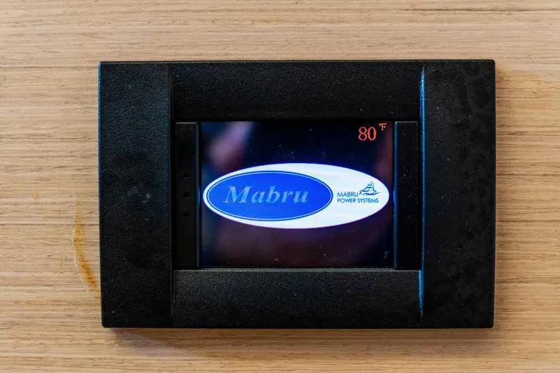 Slide: The Image of Digital thermostat display on 2023 Lagoon 46 yacht, showing 80°F by Mabru Power Systems. - 60