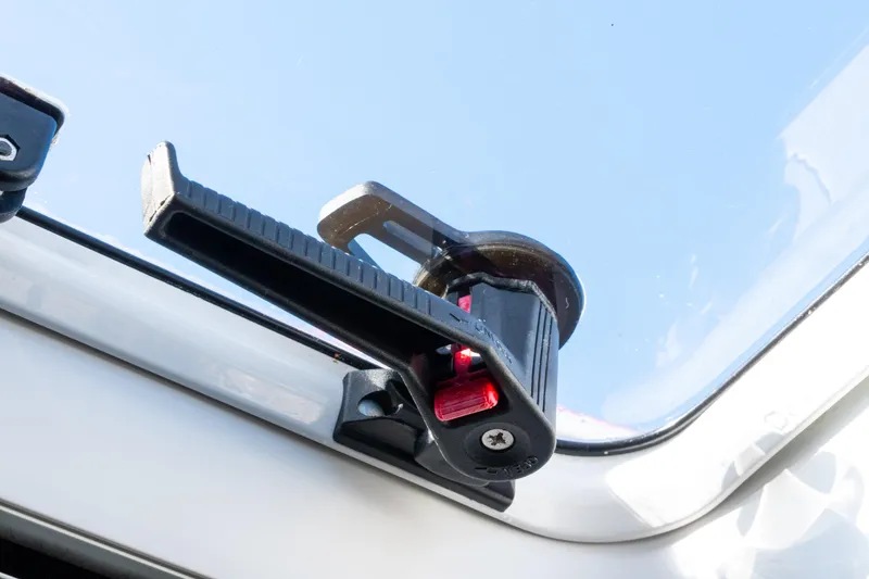 Slide: The Image of Close-up of a 2023 Lagoon 46 hatch handle against a clear sky. - 64