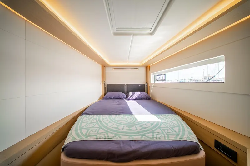 Slide: The Image of Luxurious cabin interior of 2023 Lagoon 46 yacht with modern design and ambient lighting. - 67