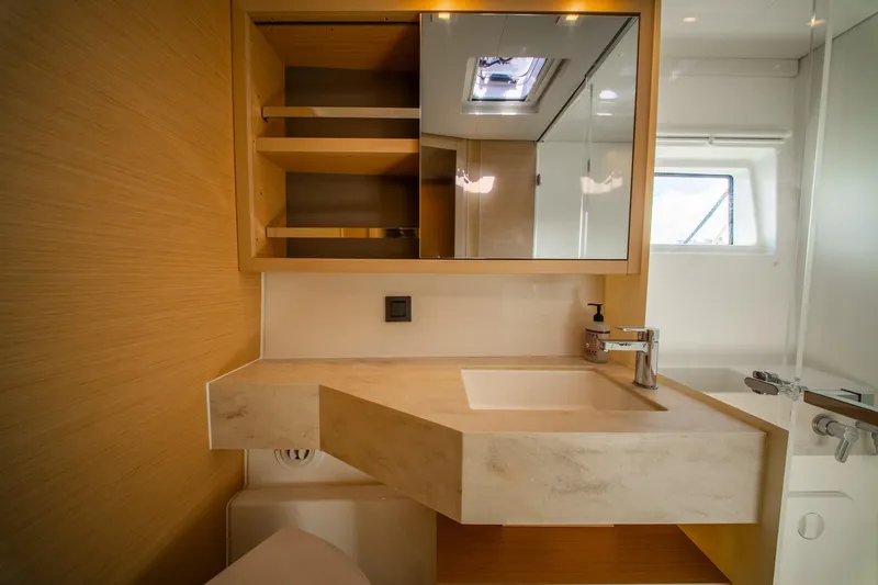 Slide: The Image of Modern bathroom interior of 2023 Lagoon 46 yacht with sleek sink and mirror. - 71
