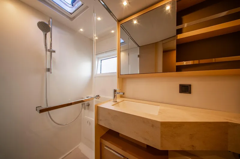 Slide: The Image of Luxurious bathroom in 2023 Lagoon 46 yacht with modern fixtures and elegant design. - 80