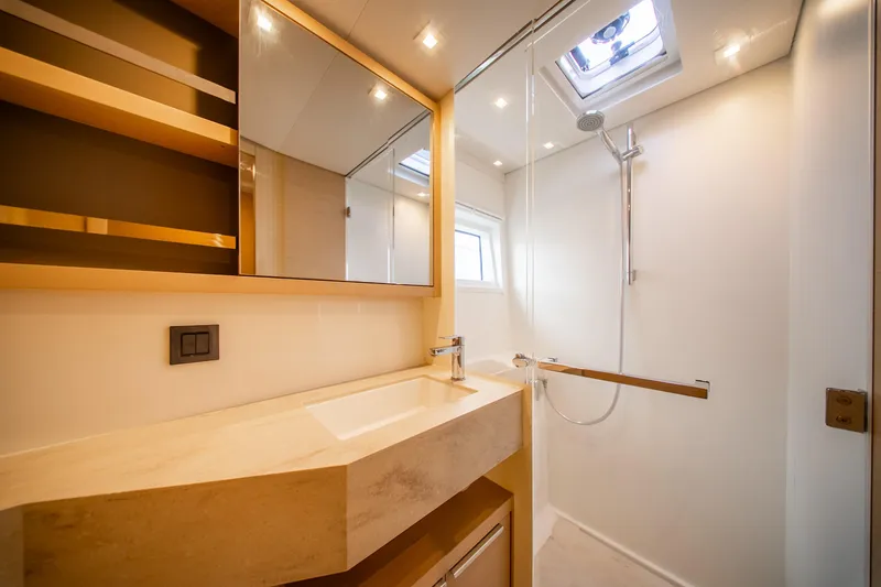 Slide: The Image of Luxurious bathroom in 2023 Lagoon 46 yacht with modern fixtures and elegant design. - 84