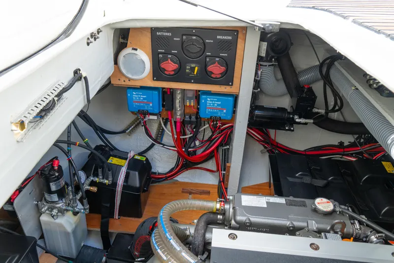 Slide: The Image of Electrical system of a 2023 Lagoon 46 yacht, featuring batteries and wiring. - 87