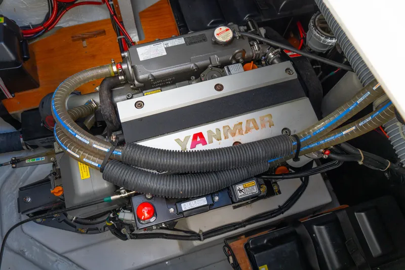 Slide: The Image of Engine compartment of 2023 Lagoon 46 catamaran featuring a Yanmar engine. - 88