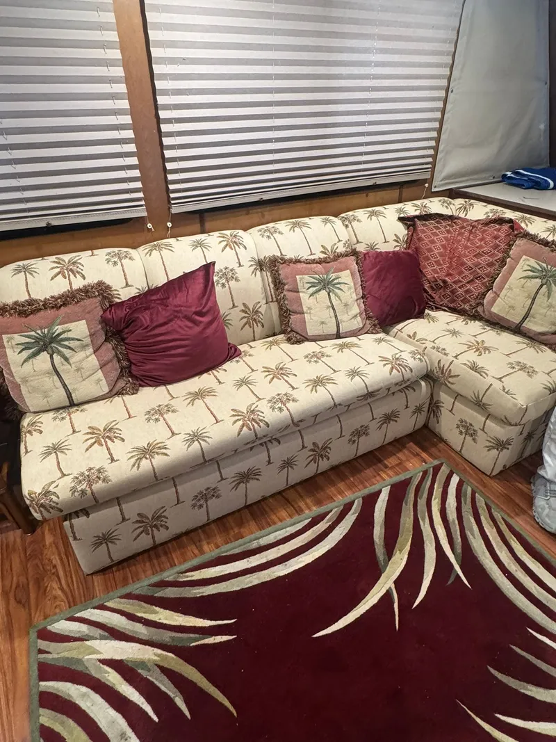 Slide: The Image of Gibson 5500 sofa from 2006 with palm pattern and cushions. - 13